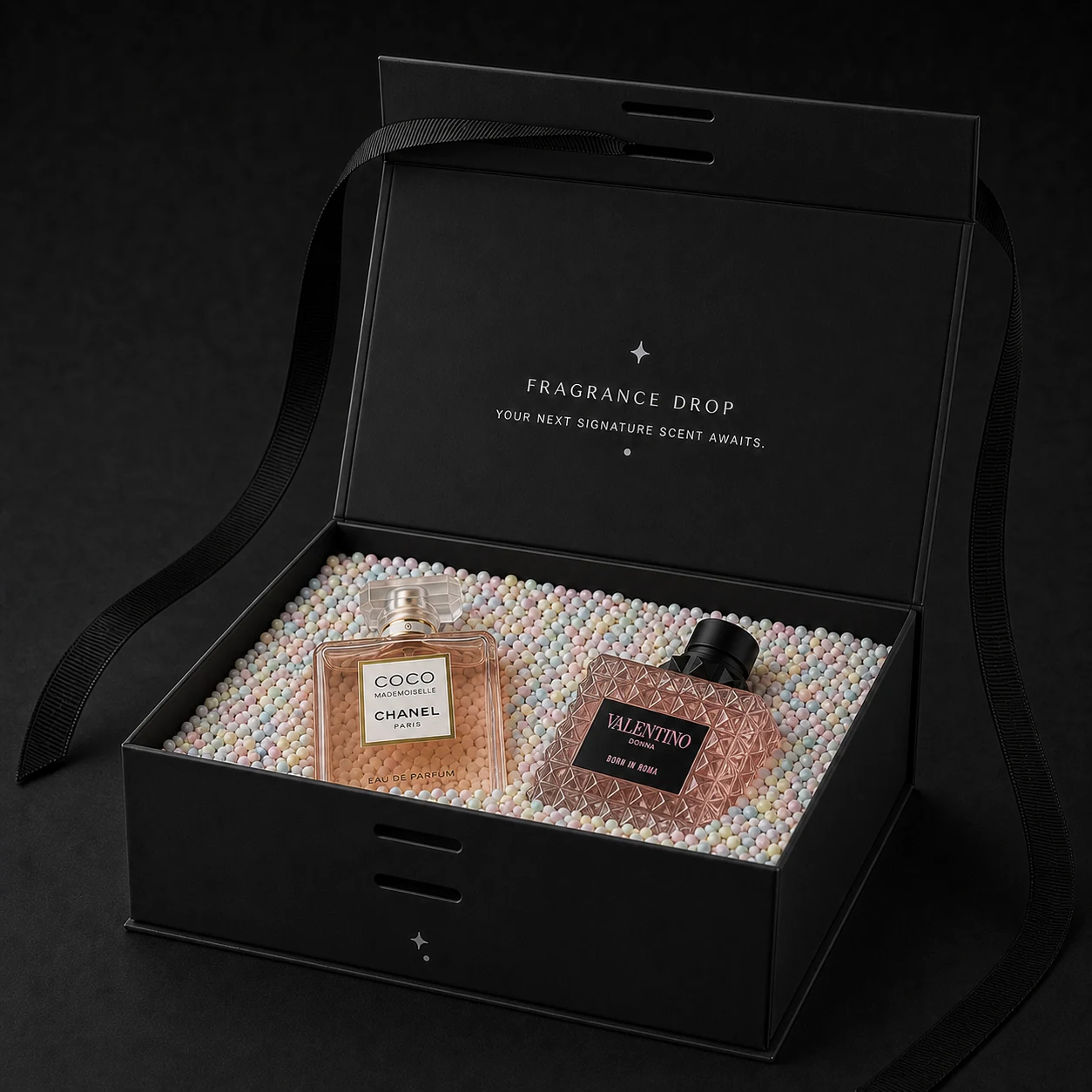 Fragrance Drop Discovery edition open with two full-size designer fragrance examples